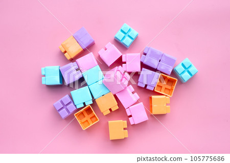 Plastic building blocks isolated on pink background. Top view 105775686