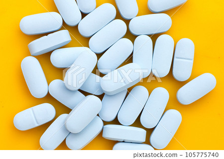 "PrEP" ( Pre-Exposure Prophylaxis) used to help protect people from HIV, yellow background. 105775740