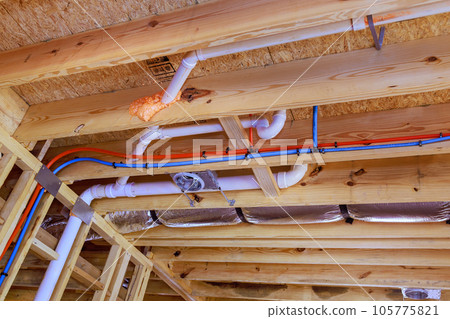 Plumbing system installation with pvc plastic drain pipe and water piping system for new home 105775821