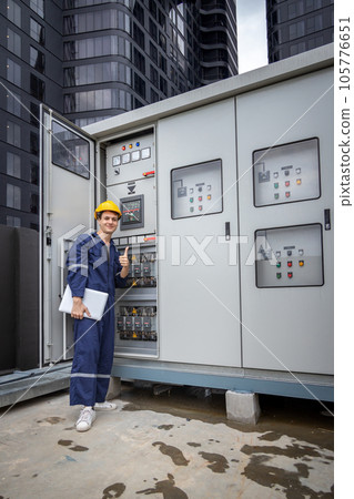Electrical engineer working in control room. Electrical engineer working in control room. 105776651