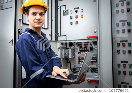Electrical engineer working in control room. 105776661