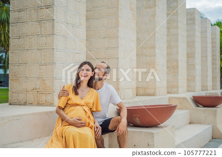 A loving couple in their 40s cherishing the miracle of childbirth in Mexico, embracing the journey of parenthood with joy and anticipation 105777221