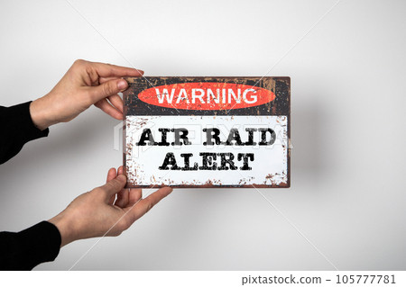 Air raid alert Warning Concept. Warning sign on a white background 105777781