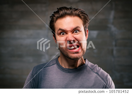 Young man emotional portrait Young man emotional portrait 105781452