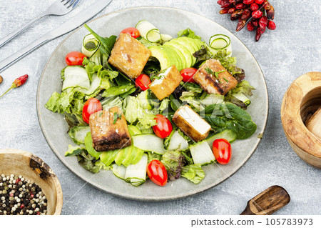 Salad with fresh vegetables and tofu. Salad with fresh vegetables and tofu. 105783973