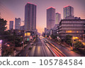 AI image Dusk in a city with high-rise apartments 105784584