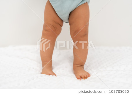 leg of baby train an infant to stand leg of baby train an infant to stand 105785030