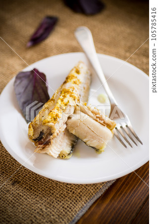 fish baked in the oven with spices, spices fish baked in the oven with spices, spices 105785416