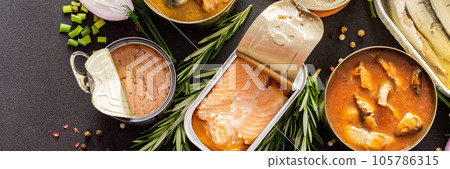 Open tin cans with canned fish Open tin cans with canned fish 105786315