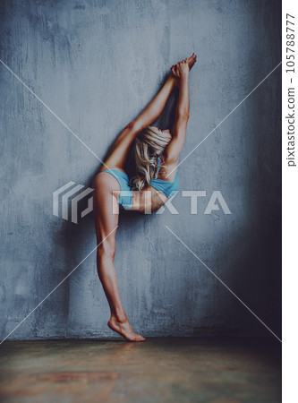 Young woman gymnast 105788777