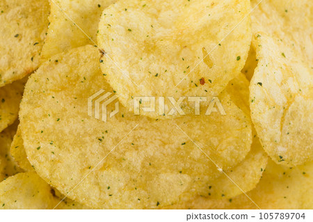 Prepared potato chips snack closeup view Prepared potato chips snack closeup view 105789704