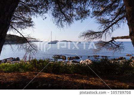 sunset and luxury yacht in the sea sunset and luxury yacht in the sea 105789708