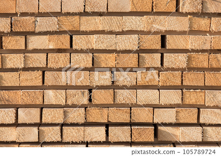 Stacked lumber background Stacked lumber background 105789724