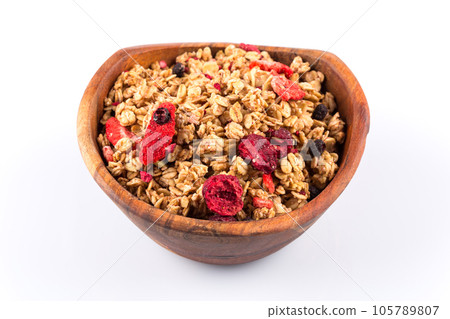 Muesli oat cereals close up background with dry fruits 105789807