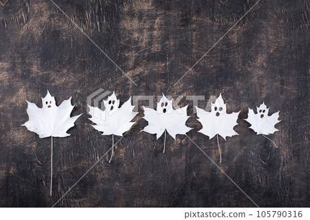 Halloween ghost from autumn leaves Halloween ghost from autumn leaves 105790316
