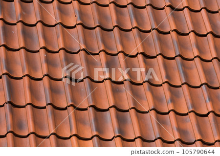 Red tiles roof background 105790644