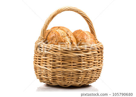 bread in wicker basket isolated on white 105790680