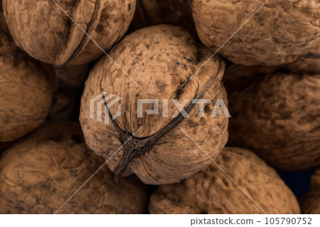 Walnut nut closeup Walnut nut closeup 105790752