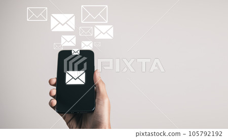 Businessman got the email message from smart phone. Information technology and network concept. Businessman got the email message from smart phone. Information technology and network concept. 105792192