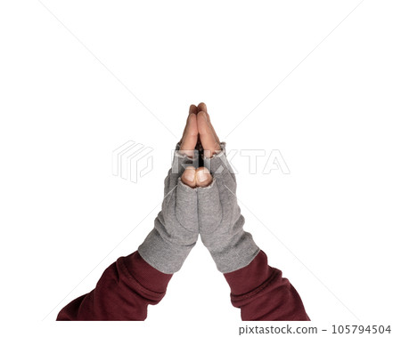 two clasped hands with gray gloves without fingers two clasped hands with gray gloves without fingers 105794504