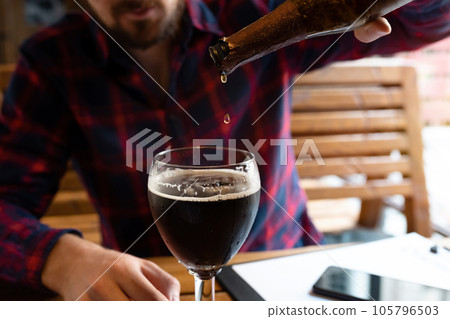 Alcohol and unhealthy lifestyle concept. Fight against alcohol addiction, loneliness Alcohol and unhealthy lifestyle concept. Fight against alcohol addiction, loneliness 105796503