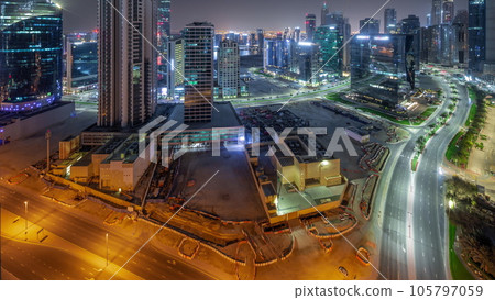 Business Bay Dubai skyscrapers with water canal aerial all night timelapse. 105797059