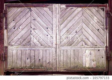 old wooden gate closed, rustic wood texture background old wooden gate closed, rustic wood texture background 105797133