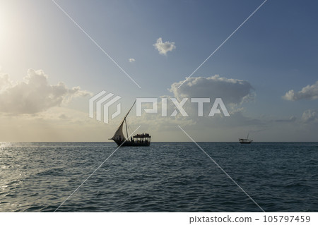 Silhouette of Dhow boat at sunny day 105797459