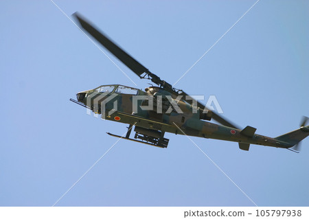 Ground Self-Defense Force anti-tank helicopter AH-1S in flight 105797938