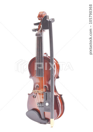 Violin with bow isolated on white background Violin with bow isolated on white background 105798368