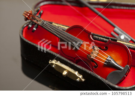 violin with bow in red velvet case violin with bow in red velvet case 105798513