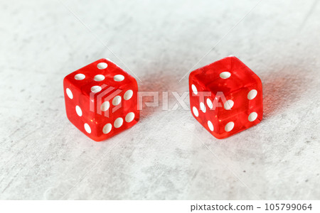 Two translucent red craps dices on white board showing Easy Six / Jimmie Hicks (number 5 and 1) Two translucent red craps dices on white board showing Easy Six / Jimmie Hicks (number 5 and 1) 105799064