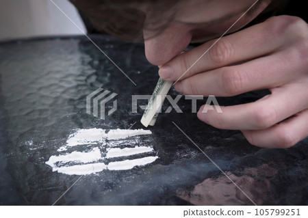 Cocaine and drug addict drug line, close up. Life style. Addiction concept 105799251