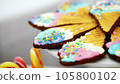 Candy bar on children's birthday. close-up, multi-colored lollipops, sweets, biscuit, cupcakes, sweet decoration for children's parties and children's anniversaries. 105800102