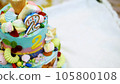 close-up, children's birthday cake, decorated with various delicacies and edible pictures. children's birthday party. 105800108