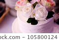close-up, snow-white cream three-story cake, decorated with roses. traditional wedding cake, wedding traditions, accessories. 105800124