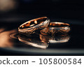 Close-up macro shot of wedding rings, detailed jewelry. 105800584