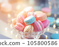 Colorful French macaron cakes on a plate, food composition. 105800586