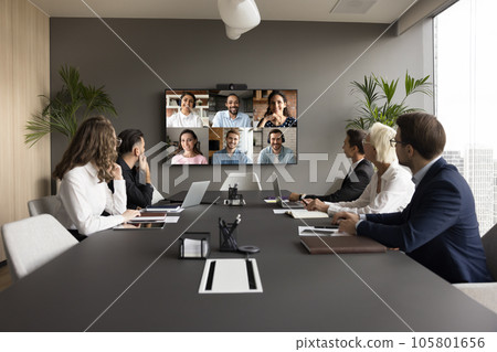 Office staff meeting with diverse team on online video conference Office staff meeting with diverse team on online video conference 105801656