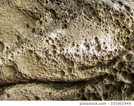 Chipped old rock background texture 105801949