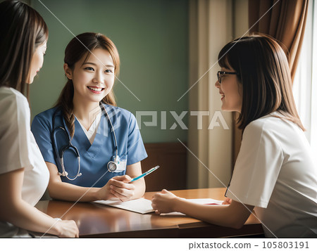 Meeting scenery at the hospital (young female doctor and female nurse) Meeting scenery at the hospital (young female doctor and female nurse) 105803191