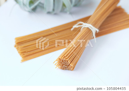 Whole wheat spaghetti (white background) Whole wheat spaghetti (white background) 105804435