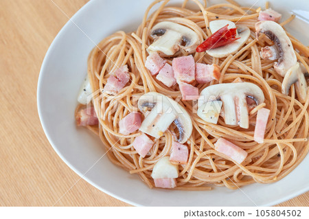 Homemade peperoncino made with whole wheat pasta Homemade peperoncino made with whole wheat pasta 105804502