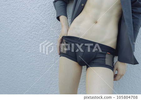 Faceless, slender man in underwear 105804708