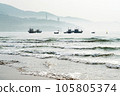 Boats floating near the beach besides the mountain in the brilliant dawn 105805374