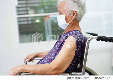 Asian elder senior woman getting vaccine for protect corona virus. Asian elder senior woman getting vaccine for protect corona virus. 105805876