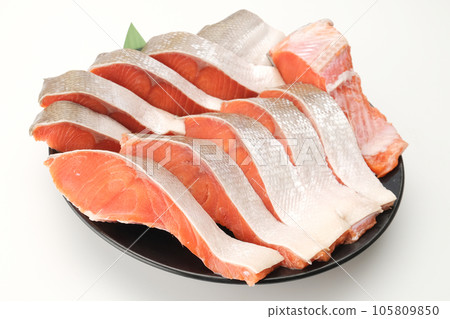 Half of sockeye salmon filleted and served on a plate Half of sockeye salmon filleted and served on a plate 105809850