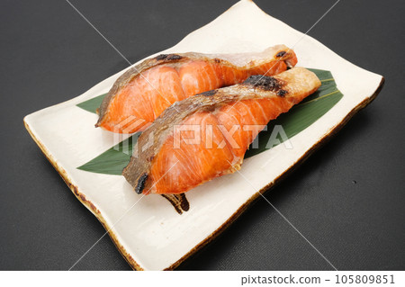 Grill fillet of sockeye salmon and serve 2 more slices 105809851