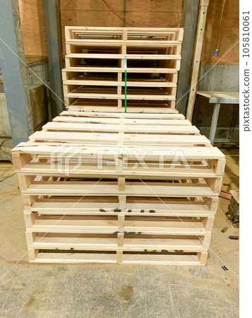 Two Stacks of wood pallets in a row Two Stacks of wood pallets in a row 105810061