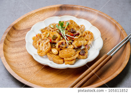 korean food yeongeunjorim, Braised Lotus Roots, Yeongeun (lotus root) parboiled and braised in a mixture of soy sauce and sugar over lower heat. Add syrup and braise to a glaze before serving. korean food yeongeunjorim, Braised Lotus Roots, Yeongeun (lotus root) parboiled and braised in a mixture of soy sauce and sugar over lower heat. Add syrup and braise to a glaze before serving. 105811852